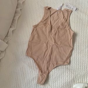 V neck , thong , slimming body suit